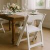 White Padded Resin Folding Chair rental in Houston, TX